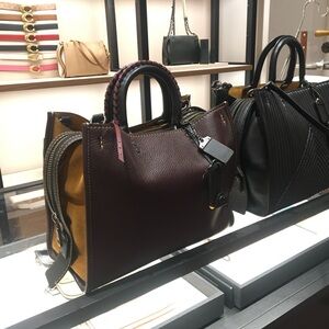 Coach Burgundy and Tan Leather Handbag